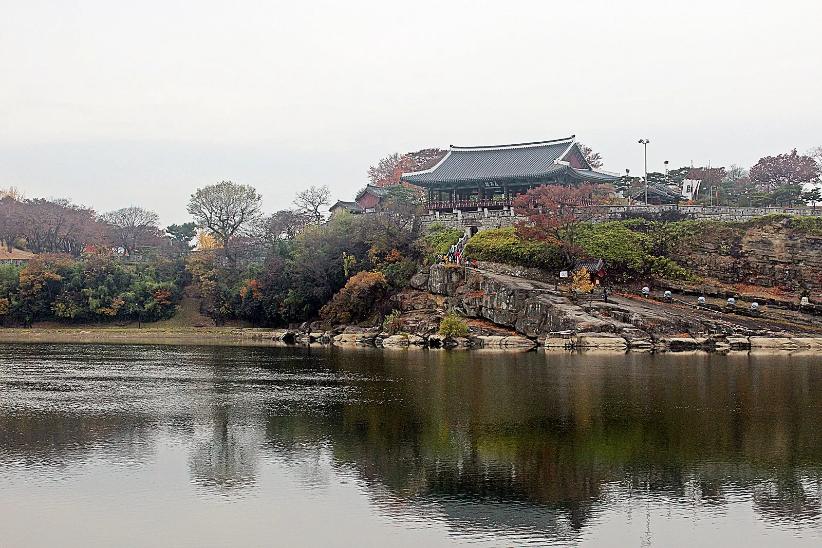 Chokseongnu Pavilion on the rocky bank of Jinjuseong Fortress, reflected in the Namgang River
