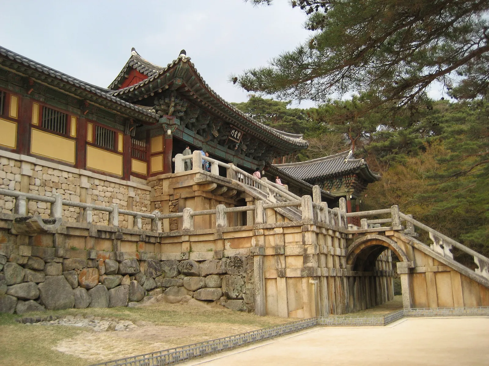Stone stairways and arched terrace walls below the wooden halls of Bulguksa Temple in Gyeongju