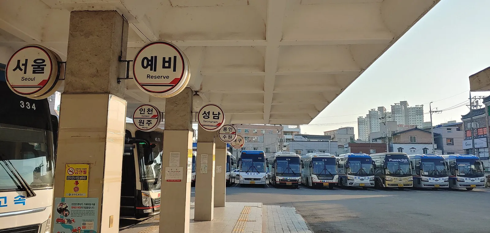 Row of express buses parked at the platforms of Jinju Express Bus Terminal