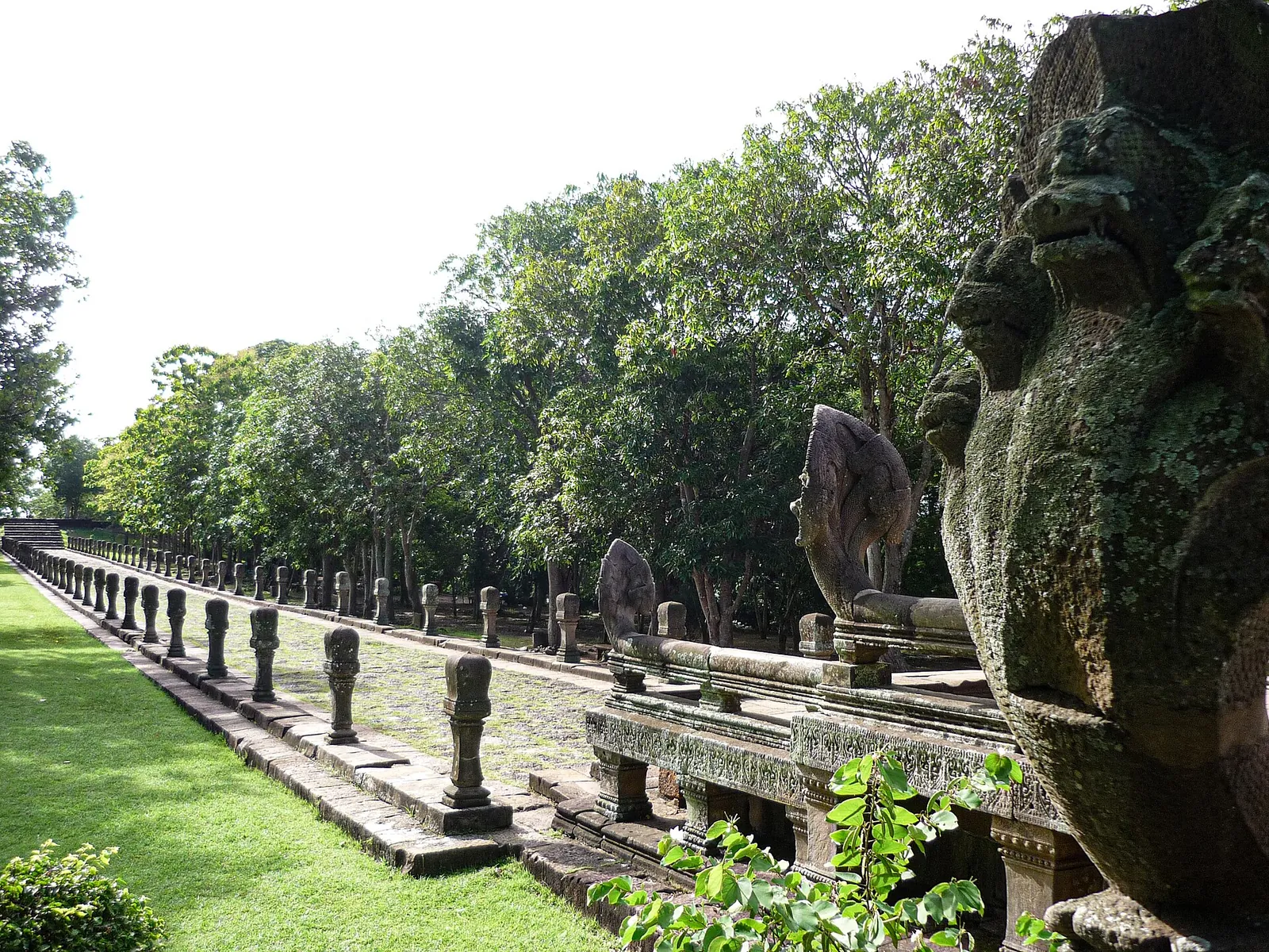 The long processional way to Phanom Rung lined with sandstone posts and a naga head