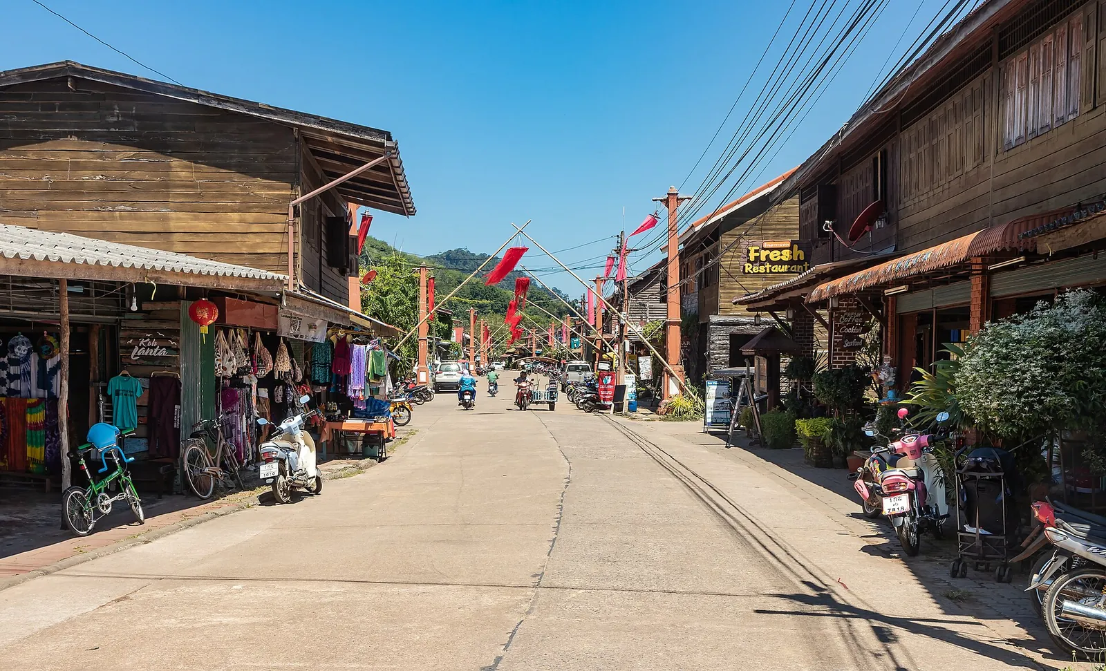Wooden shophouses lining the main street of Lanta Old Town