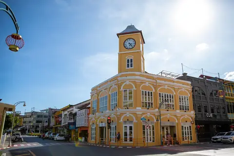 The yellow colonial-style old police station with its clock tower in Phuket Old Town