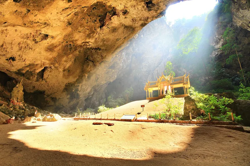 Sunlight falling through the roof of Phraya Nakhon cave onto the small royal pavilion