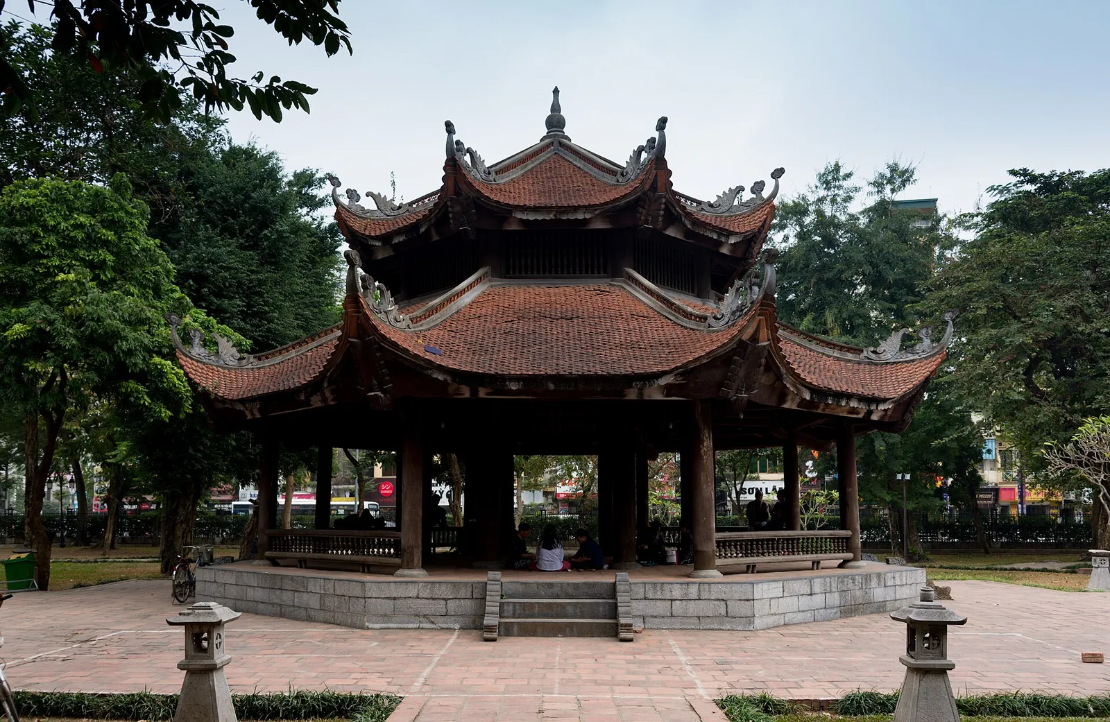 A pavilion with curved tiled roofs in a courtyard of the Temple of Literature in Hanoi