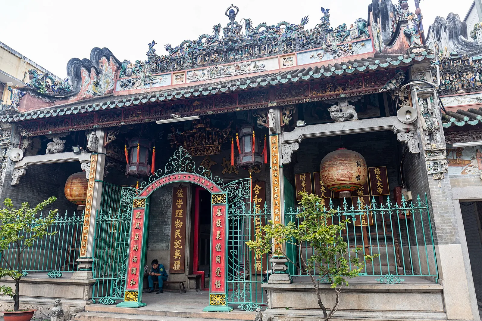 The ornate gateway of Thien Hau Temple on Nguyen Trai Street, with ceramic figures along the roof ridge