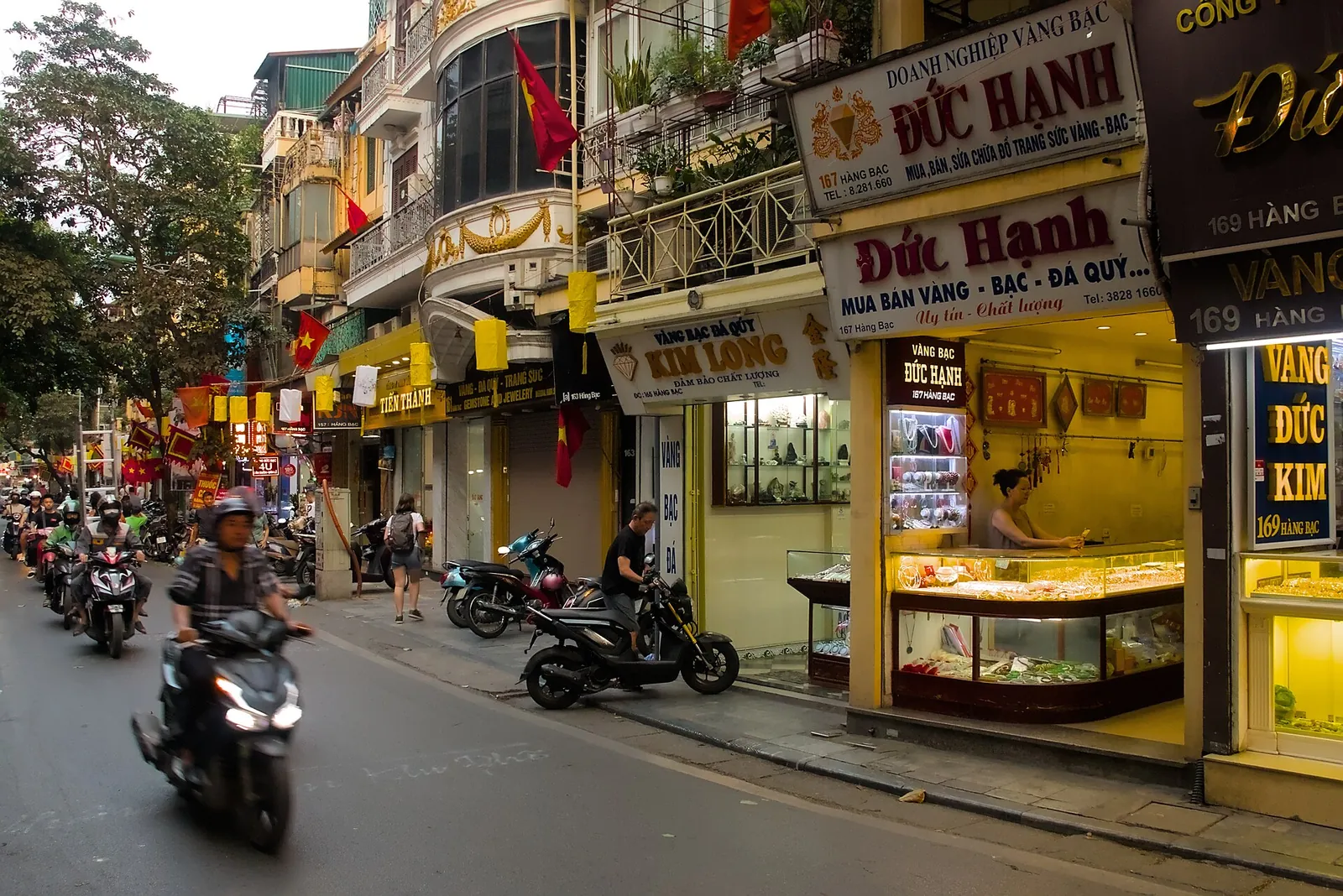 Jewellery shops and motorbike traffic on Hang Bac Street in Hanoi's Old Quarter