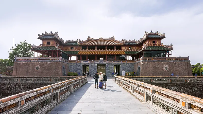 The Ngo Mon (Meridian) Gate of the Hue Imperial City seen across its stone bridge under a bright sky